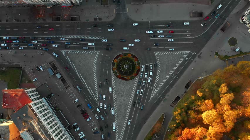 Flying over Kiev, Ukraine. Independence Square, aerial view. sunset, golden hour. Kiev city center aerial sightseeing.Central part of the Ukrainian capital with many historical buildings and srteets