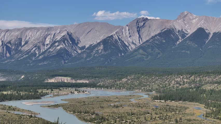 Drone view of the North Saskatchewan River as it cuts through the Kootenay Plains Ecological Reserve and Mt. William Booth in the background