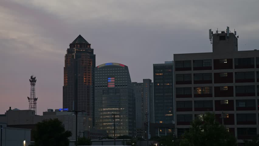 Downtown Des Moines, Iowa at sunset with timelapse video.