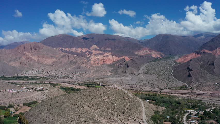 Wide forward aerial of El Pucará de Tilcara in rural Jujuy, Argentina