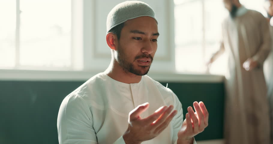 Islam, prayer and man in mosque with faith, mindfulness and gratitude with commitment to faith. Worship, religion and Muslim person in holy temple praise, spiritual teaching and learning with peace. Royalty-Free Stock Footage #1108061717