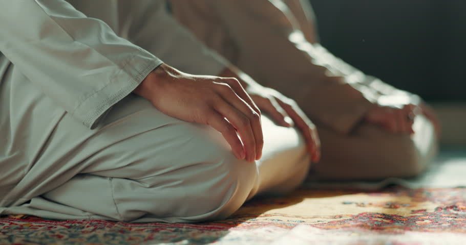 Islam, prayer and men kneeling in mosque with faith, mindfulness and gratitude in meditation. Worship, religion and Muslim people together in holy temple for praise, spiritual teaching and peace. Royalty-Free Stock Footage #1108061897