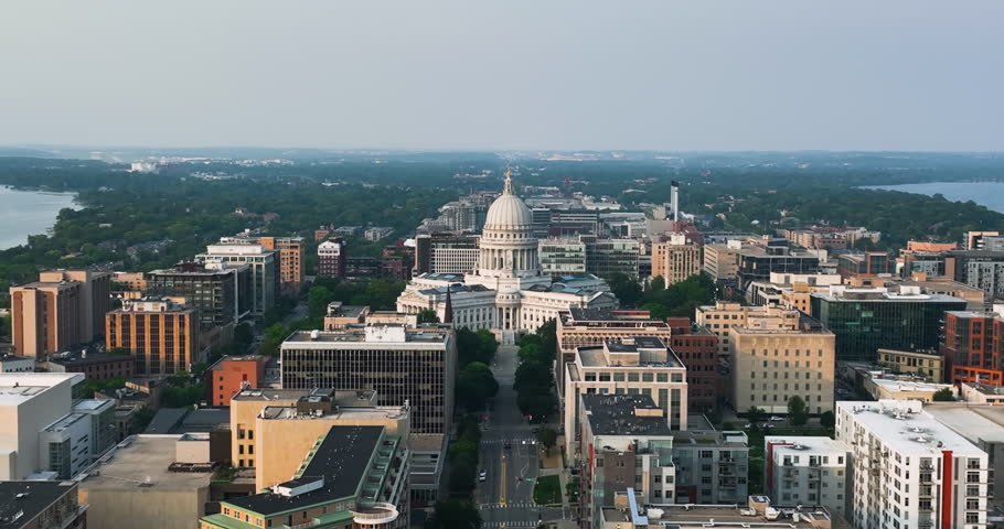 Aerial toward capitol building in Madison, Wisconsin. Late afternoon light