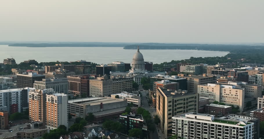 Aerial view of Madison Capitol Building at sunset. Lake  Mendota in the background