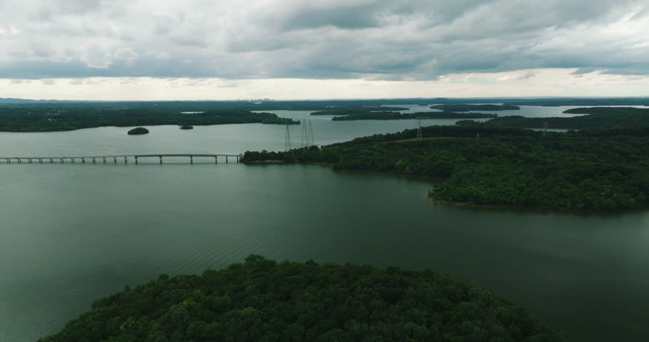 Cloudy Sky Over Long Hunter State Park On The Shores Of Percy Priest Lake In Hermitage, Tennessee, USA. aerial pan right