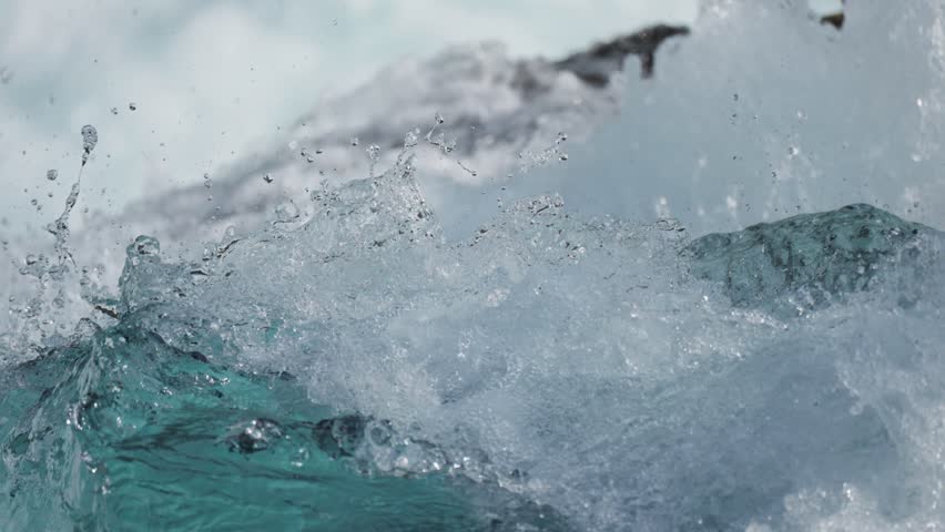 Slow motion shot of flowing water along rapids of Loen water in Norway at daytime. Royalty-Free Stock Footage #1108071715