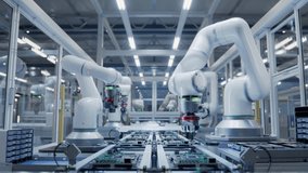 Timelapse of Automated PCB Assembly Line Equipped with Advanced High Precision Robot Arms at Bright Electronics Factory. Semiconductor Production Industry. Component Installation on Circuit Board - Powered by Shutterstock - Get 15% off with code: PIKWIZARD15