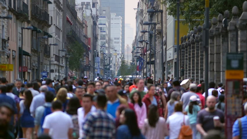 Blurred, slow motion shot of people walking on busy pedestrian street in the historic center of Mexico City, defocused shot showing crowd of anonymous citizens and tourists in the Mexican capital.  Royalty-Free Stock Footage #1108079813