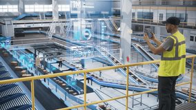 Male in a High Visibility Vest Using Tablet with Augmented Reality App. Worker Monitoring Efficiency in a Logistics Center with Automated Belt Conveyors for Sorting Retail Orders. VFX Visualization - Powered by Shutterstock - Get 15% off with code: PIKWIZARD15