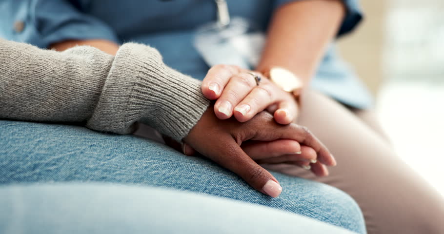 Nurse, holding hands and empathy for patient with mental health, crisis or kindness in healthcare, clinic or hospital. People, together and doctor with support, compassion and help for woman in pain Royalty-Free Stock Footage #1108090617