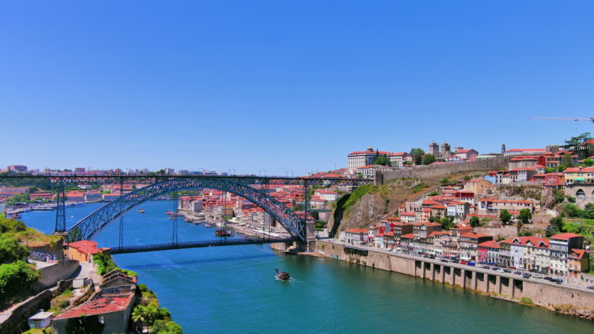 Porto, Portugal: Aerial view of famous historic European city, center with iconic Luís I Bridge (Ponte Luís I) over Douro river, Ribeira district - landscape panorama of Southern Europe from above Royalty-Free Stock Footage #1108091041