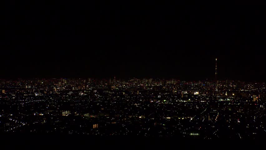 TOKYO, JAPAN : Aerial high angle sunrise view of CITYSCAPE of TOKYO and MOUNT FUJI. Rising sun and buildings at downtown area. Japanese city life and nature concept. Time lapse shot, night to morning.