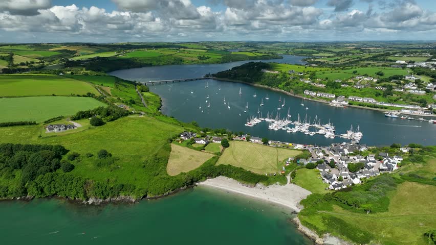 Aerial Drone footage of Kinsale Pier with Bridge and Sailboats 4k Ireland Summer Royalty-Free Stock Footage #1108098107