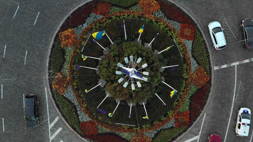 Flying over Kiev, Ukraine. Independence Square, aerial view. sunset, golden hour. Kiev city center aerial sightseeing.Central part of the Ukrainian capital with many historical buildings and srteets