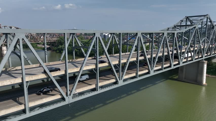 Traffic on Brent Spence Bridge over the Ohio River. State border of Kentucky and Ohio. People entering Cincinnati and Covington.