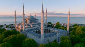 Aerial view of Hagia Sophia and Blue Mosque at sunrise and night. Aerial view of Istanbul - Powered by Shutterstock - Get 15% off with code: PIKWIZARD15