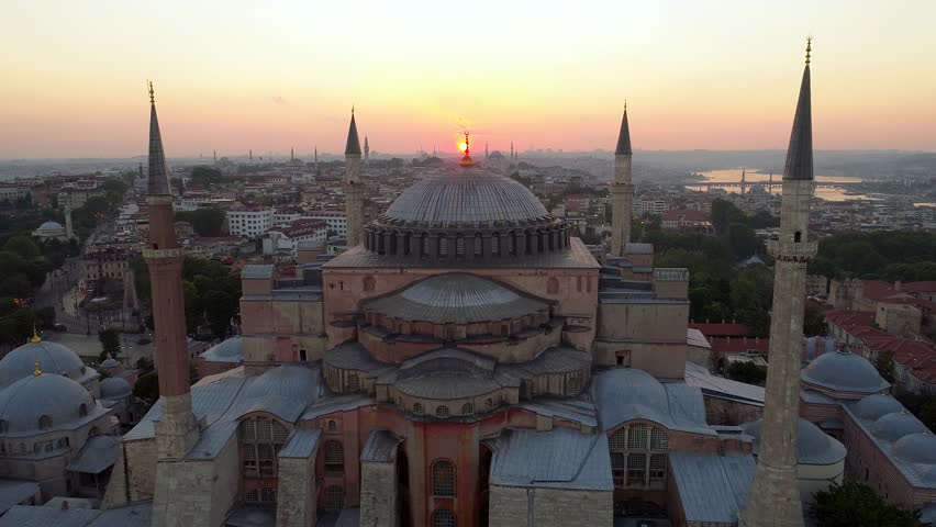 Aerial view of Hagia Sophia and Blue Mosque at sunrise and night. Aerial view of Istanbul