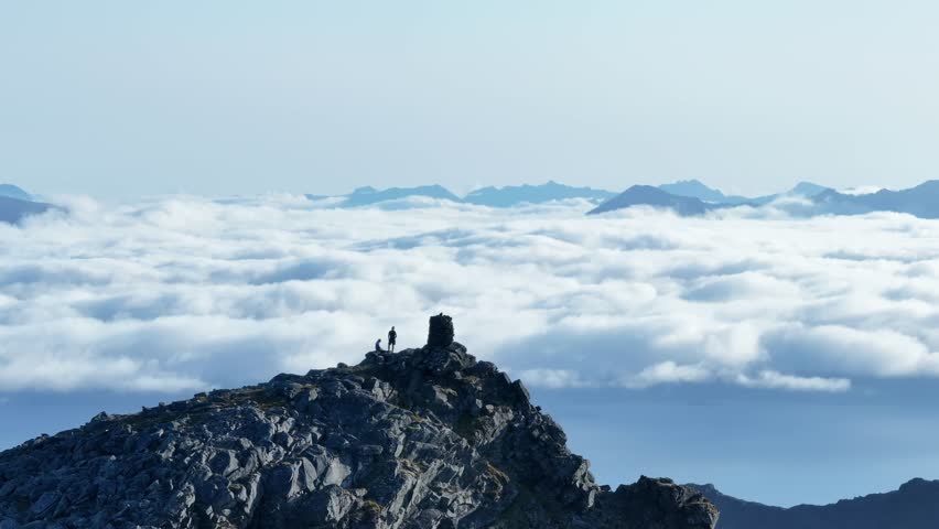 Aerial View Of People On The Mountain Peak Of Lonketinden In Senja Island, Northern Norway. 