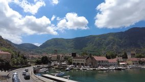 Kotor, Montenegro - - August 4, 2023: A view of the Bay of Kotor, the port, and marina from the walls of the Old City