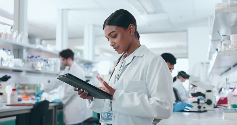Science, tablet and woman in a laboratory with research, online data and pharmaceutical study. Female scientist, working and investigation for medical, healthcare and chemistry work for biotech Royalty-Free Stock Footage #1108107053