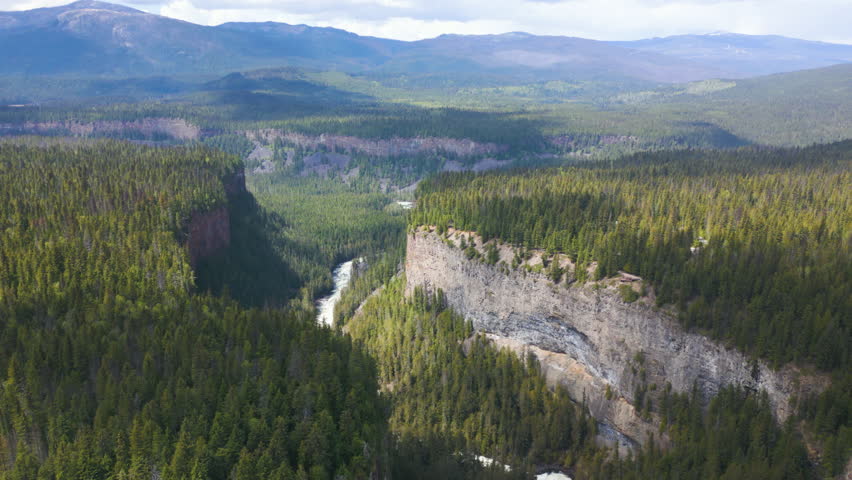 Stunning landscape over Helmcken Falls, Canada. Aerial flying backwards
