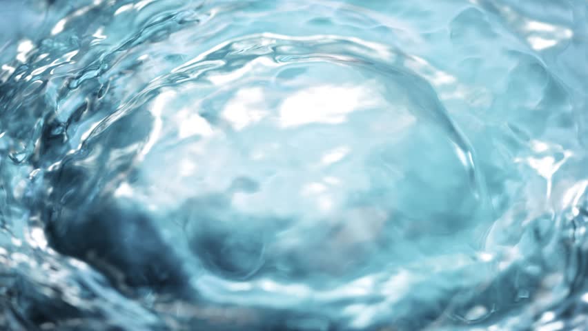 Super Slow Motion Shot of Waving Light Blue Water Surface at 1000fps.