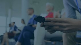 Animation of stock market data processing against mid section of a man using smartphone at office. Global economy and business data technology concept - Powered by Shutterstock - Get 15% off with code: PIKWIZARD15