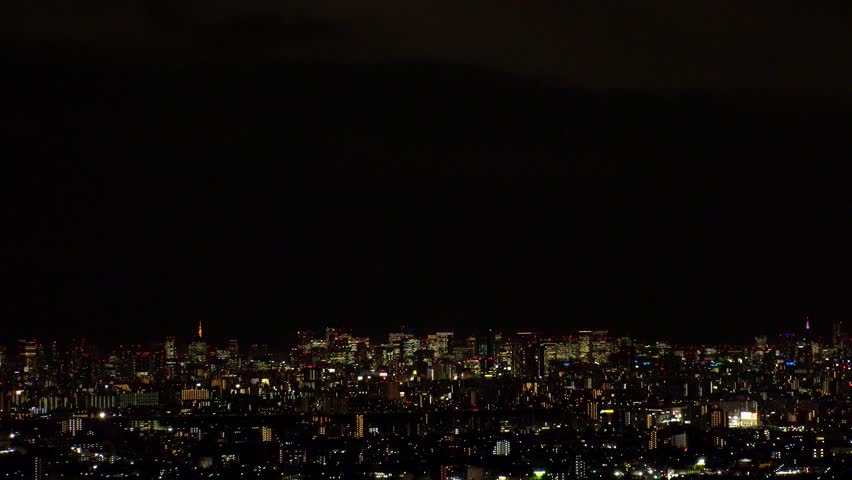 TOKYO, JAPAN : Aerial high angle sunrise view of CITYSCAPE of TOKYO and MOUNT FUJI. Rising sun and buildings at downtown area. Japanese city life and nature concept. Time lapse shot, night to morning.