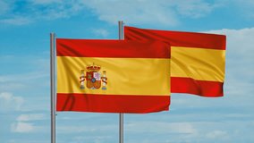 Two Spain flags waving together in the wind on blue sky, cycle looped video, two country cooperation concept