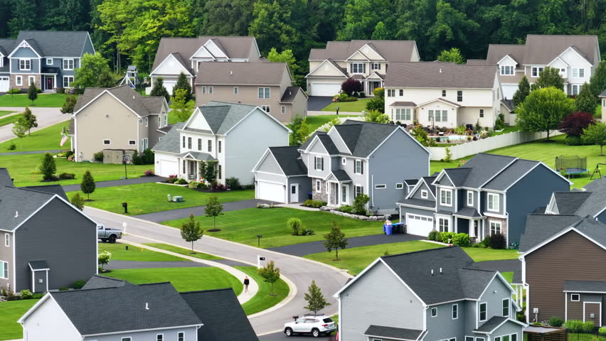 American dream homes as example of real estate development in US suburbs. View from above of residential houses in living area in Rochester, NY Royalty-Free Stock Footage #1108160261