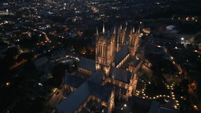 Lincoln Cathedral, Lincolnshire - 01 09 2023 - Aerial 4k video of cathedral during the night time 