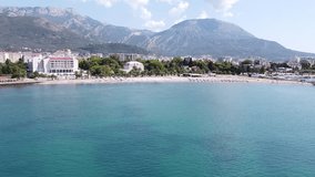 Explore the breathtaking drone footage of Bar, Montenegro, located on the shores of the Adriatic Sea. Discover the unique landscapes and historic charm of this city from above.