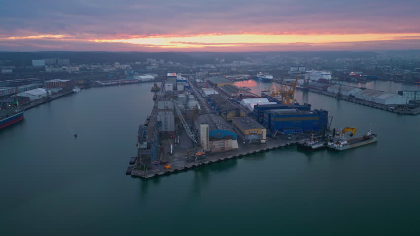 Orbital Fly Over the Marine Empty Port in Gdynia, Poland. Drone View of the Massive Harbour Port for Logistic Ships. Water Cargo Transportation and Logistics, International Business Concept