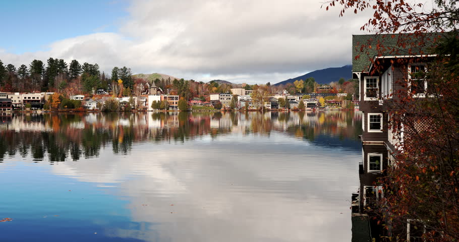 Lake Placid village reflects over Mirror Lake in the Adirondack Mountains of New York State