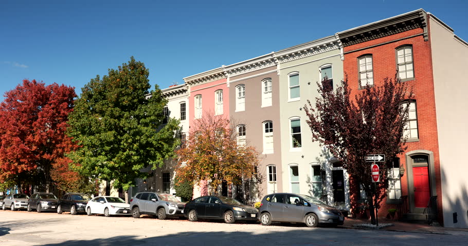 Historic row houses in federal Hill near the Inner Harbor of Baltimore Maryland flowing out to the Patapsco River and Chesapeake Bay