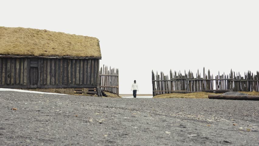 Man Walking Into Viking Village, Tourist Attraction of Iceland 50fps