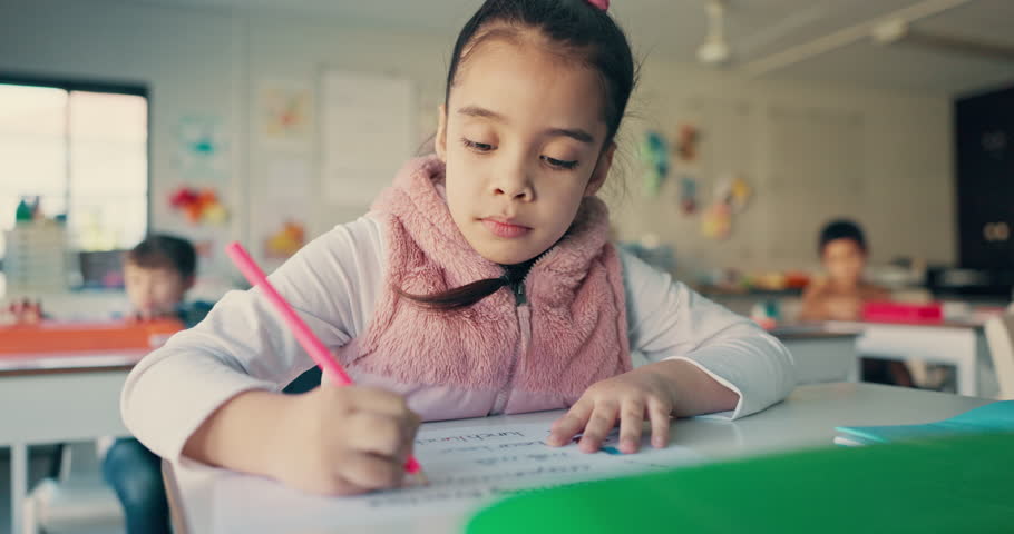 Girl child, education and student writing in classroom with learning, knowledge and academic growth. Activity, studying and lesson, notebook for drawing or test, creativity at school and development