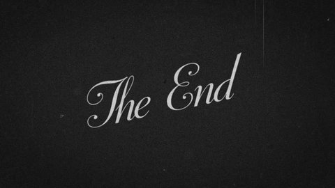 The End. Film final credits. Old film look with dirt scratches, light leaks, grain texture, vintage realistic flickering. Noise. Loop. Stock-video
