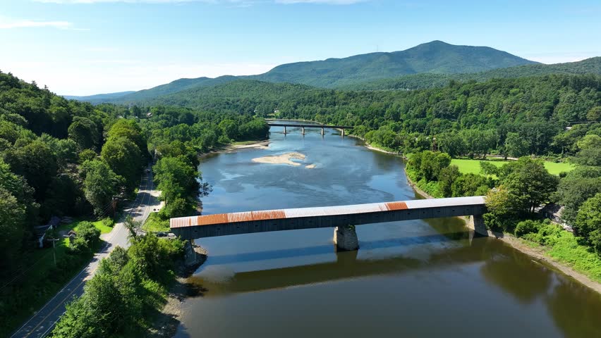Flying along the Connecticut River and passing over the Cornish Windsor covered bridge.