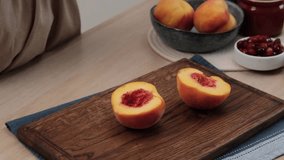 The process of making a shortcrust pastry pie.Kneading the dough and making buttercream.Woman prepares a sweet shortbread pie with peaches and cranberries.Video recipe - step by step cooking