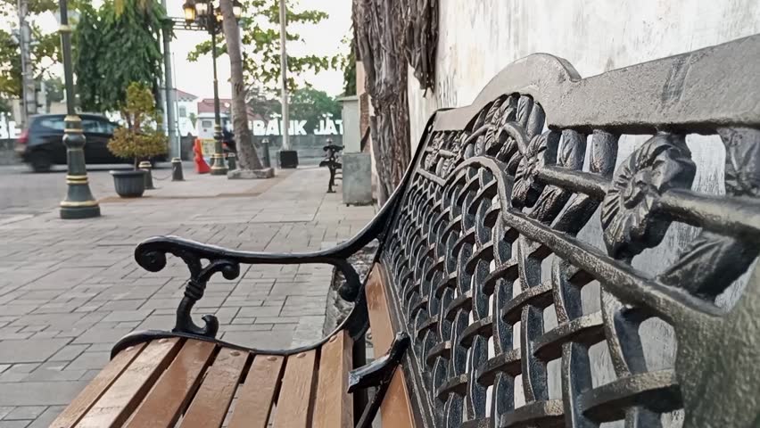 antique and vintage chairs in the old city of Semarang with a traffic background