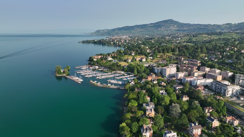 Aerial view of Lake Geneva in Switzerland near Montreux. Coastline of Lake Geneva with yachts and houses