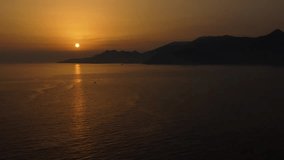 Aerial view on the Ionian sea at the sunset. Top view from drone on the Greece coast.