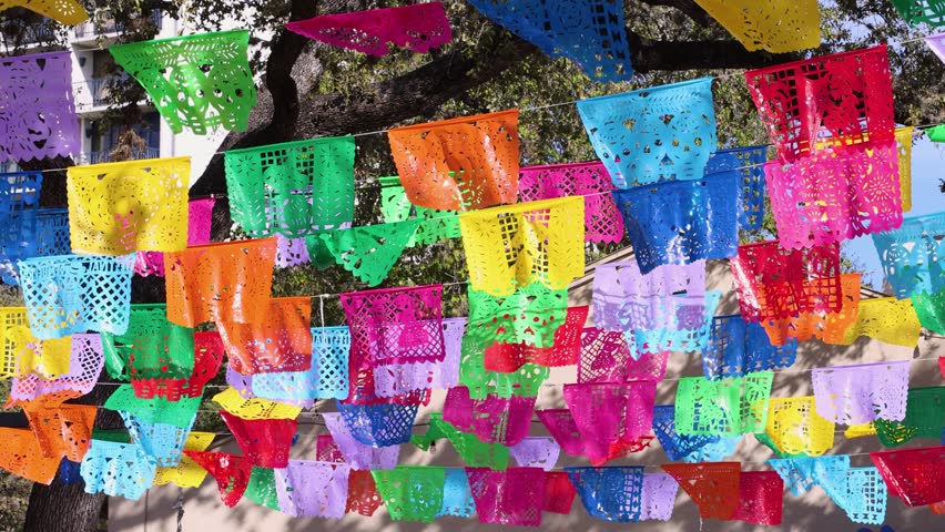 Colorful Mexican papel picado used to decorate for Dia de los Muertos. Festive Royalty-Free Stock Footage #1108204187