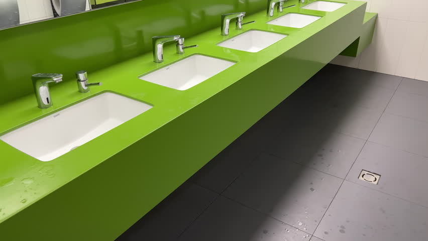 Rows of modern square washbasins in a public restroom Royalty-Free Stock Footage #1108210809