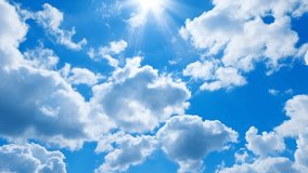 Blue sky with sun and clouds. Beautiful bright nature. Seamless looping video animation background 