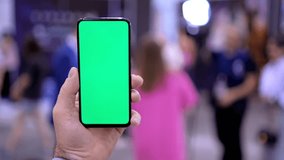 Green Screen and Chroma Key of Smartphone. Closeup. Businessman Using Smart Phone for Work. Man Connects to Chat or Video Conference. Greenscreen of Chromakey Mock-Up 4K