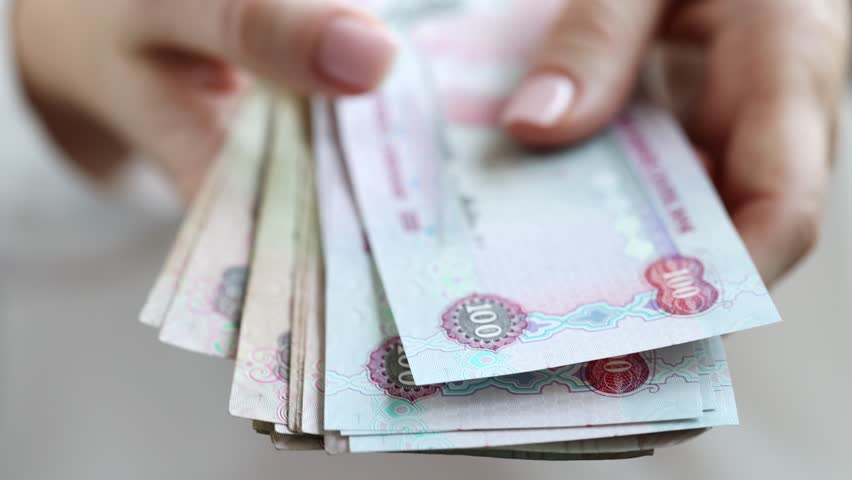 Woman Counting AED Dirhams in hands, closeup. High quality 4k footage. Royalty-Free Stock Footage #1108225415