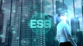 ESG. Businessman Working in Office among Skyscrapers. Hologram Concept - Powered by Shutterstock - Get 15% off with code: PIKWIZARD15