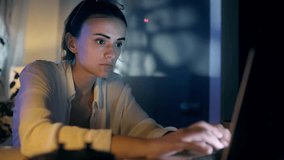 Portrait of Female Digital Entrepreneur Working on Computer. Line of Code Projected on His Face and Reflecting. App developer looking at hologram of machine learning data algorithm - Powered by Shutterstock - Get 15% off with code: PIKWIZARD15